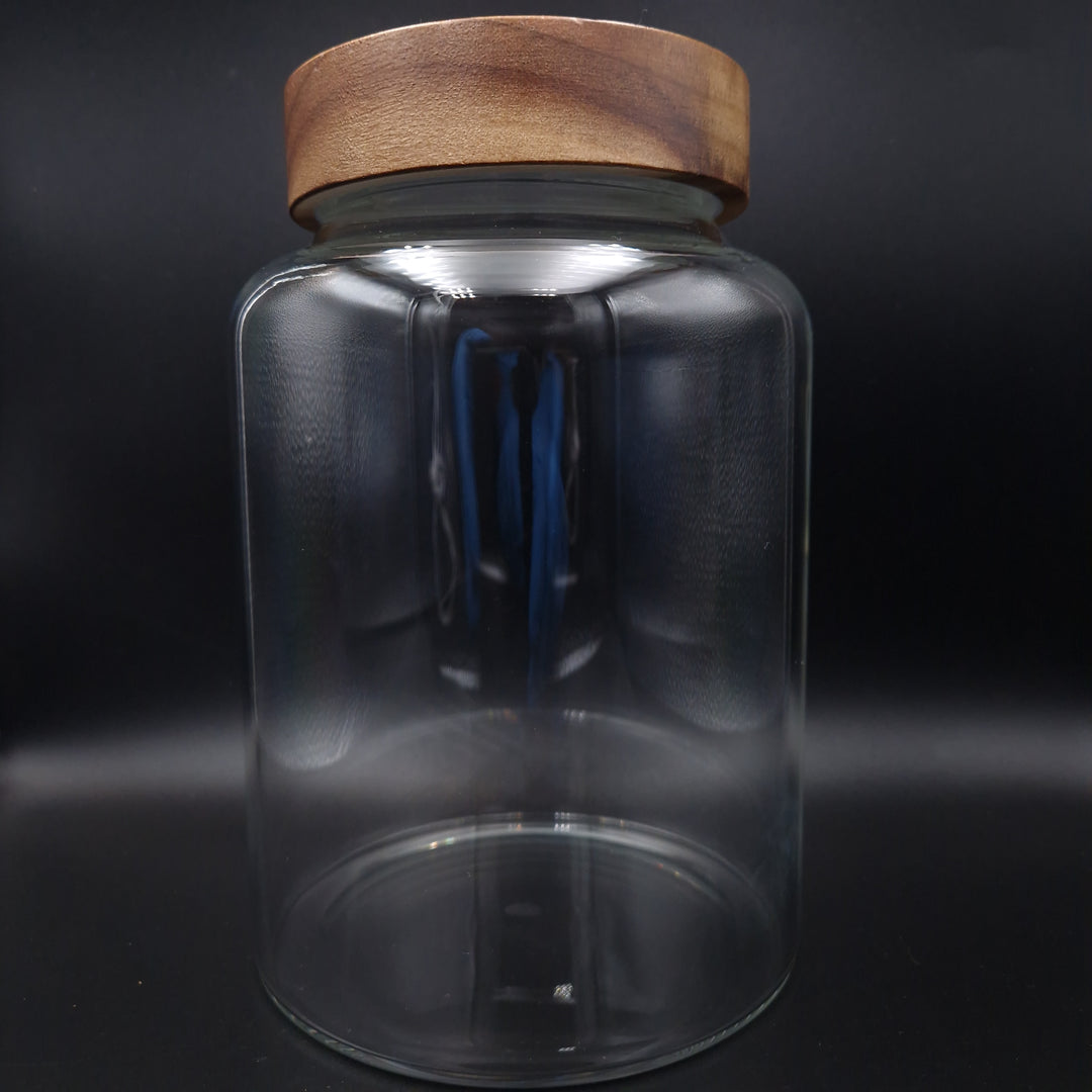 Glass storage jar with wooden screw lid